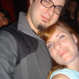 Couple Posing Together at a Nightlife Venue