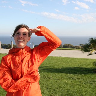 Smiling Woman Gazing Out at the Pacific Ocean