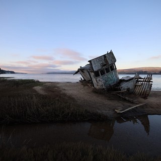Abandoned Shipwreck at Twilight on California Coast