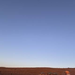 Blue Vault Over Desert Dunes: A Skyward Journey