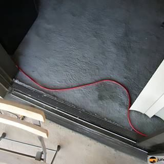 Red Cord Connected to Door Handle