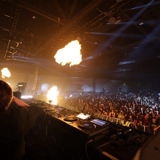 DJ Ignites the Crowd with Pyrotechnic Fury