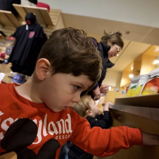 Young Boy Crafting at Baby Rave Event