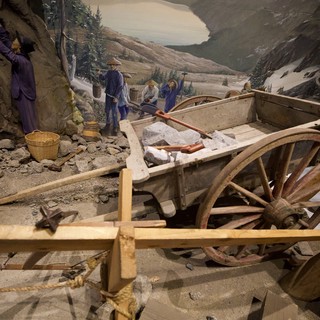 Historical Mining Diorama with Wooden Cart and Workers
