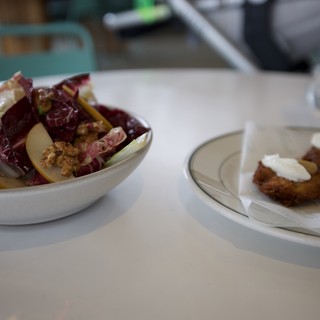 Elegant Bistro Meal with Salad and Fried Appetizer