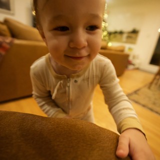 Joyful Toddler Playing at Home During Christmas Season