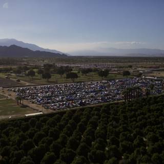 Aerial view of Coachella parking lot surrounded by trees