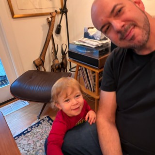 Father and Toddler Bonding at Home Office