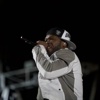 50 Cent Takes the Stage in White