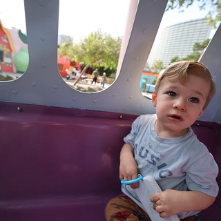Toddler's Playful Moment at Theme Park Playground