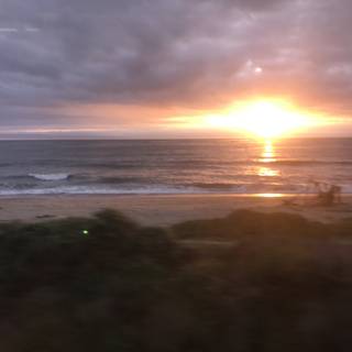 Train Window Sunset Over the Ocean
