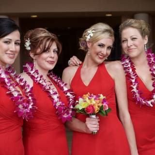 Stunning Bridesmaids in Red Dresses with Beautiful Flower Bouquets
