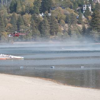 Two Helicopters Fly Over Lake with Boat