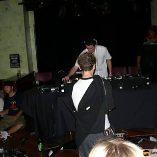 DJ Entertaining a Crowd at Substance 7