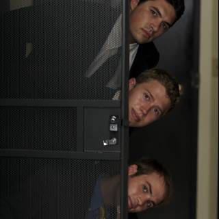 Three Suited Gentlemen in the Elevator