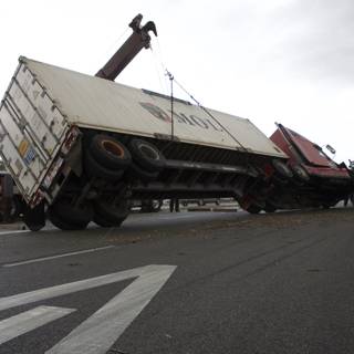 Road Mishap: Truck Overturned on Tarmac