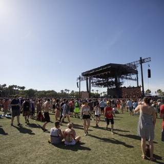 Coachella Crowd Soars Under Blue Sky