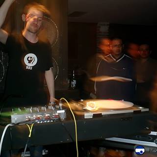 Club DJ spinning energy through the night