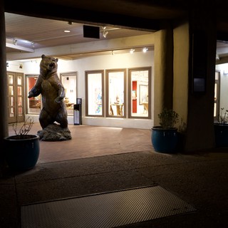 Night View of Art Gallery with Bear Sculpture