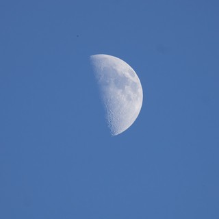 Waxing Gibbous Moon in Clear Blue Sky