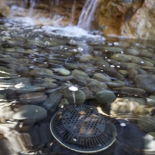 Underwater Fountain Drain with Smooth River Stones