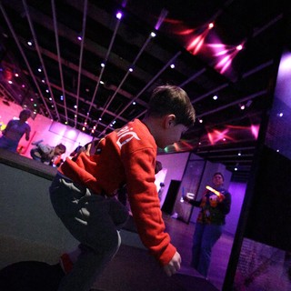 Child in Red Hoodie at Baby Rave Event