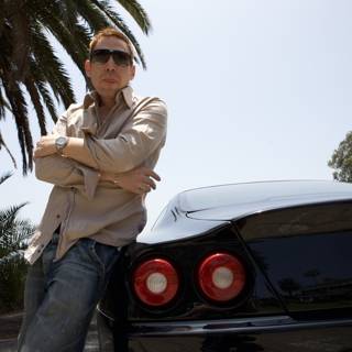Man and Machine: Posing with a Ferrari