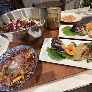 Home-Cooked Feast with Whole Fish and Fresh Salad