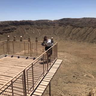 Taking in the View: Girl Stands on Crater's Edge