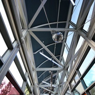 Modern Glass Corridor with Structural White Beams