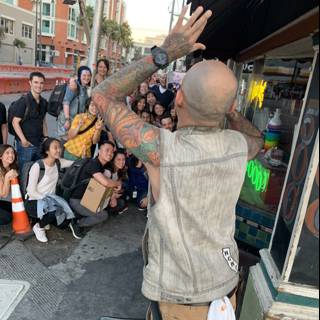 Tattooed man poses with group in San Francisco