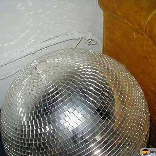 Silver Disco Ball Shining on the Floor