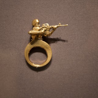 Vintage Brass Soldier Ring in Museum Display