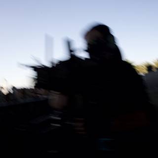 Mystery in Motion: Silhouette of a Man at Dusk
