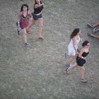 Three Friends Enjoy a Relaxing Stroll at Coachella Festival
