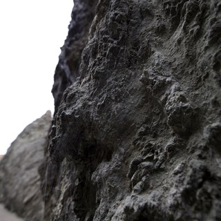 Ancient Coastal Cliffs Draped in Spider's Silk