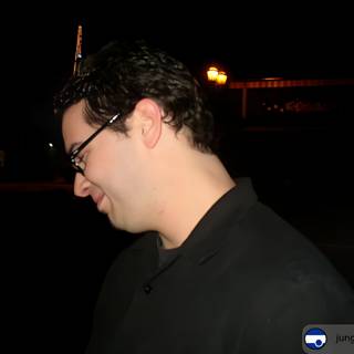 Nighttime Portrait of a Bespectacled Man