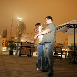 Rooftop Romance Dancing Under Smoky City Skies