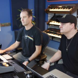 Music Production Duo Cozy Up in Studio