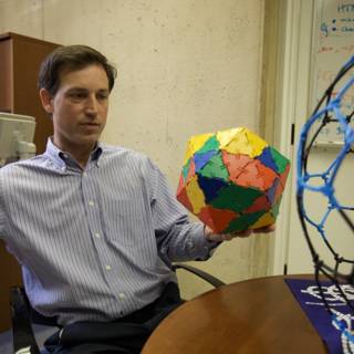 Colorful Ball Held by a Man