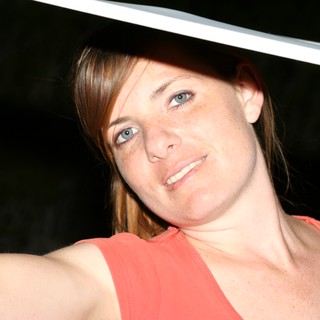 Young Woman Looking Up in Night Portrait