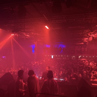 Skrillex and Four Tet Concert Bathed in Red Light