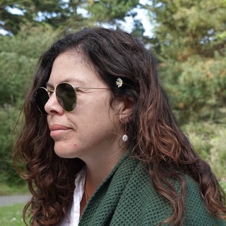 Woman in Green Cardigan Enjoying Nature