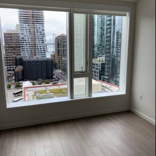Empty Room with Spectacular City View