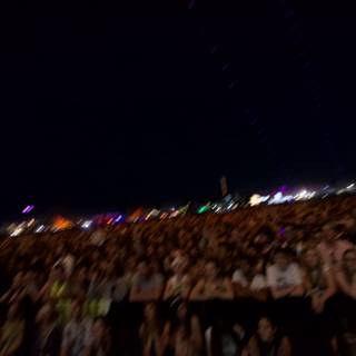 Coachella Crowd Shines Under Night Sky