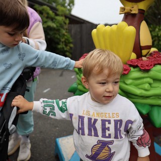 Young Children Explore Hot Air Balloon Festival Sculpture
