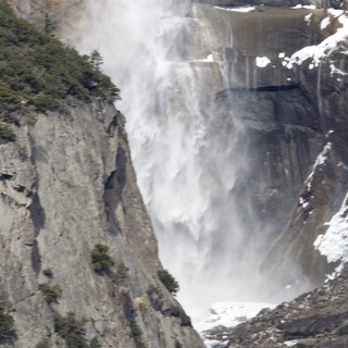 Powerful Waterfall Cascading Down Yosemite's Granite Cliffs