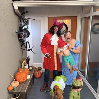 Peter Pan Family Halloween Costume on Decorated Porch