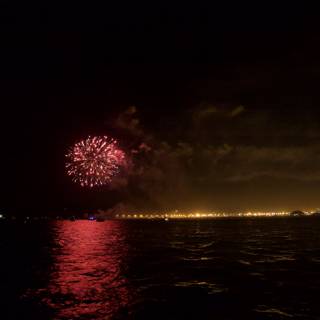 Spectacular Fireworks Display Reflecting on Water