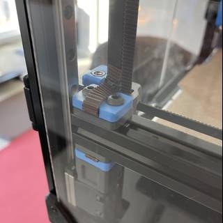 3D Printer with Blue Handle